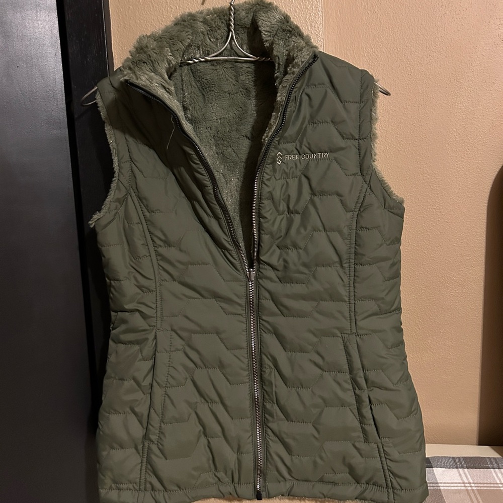 Free country reversible vest.  Olive green.  Like new.  Worn once.  Size small.
